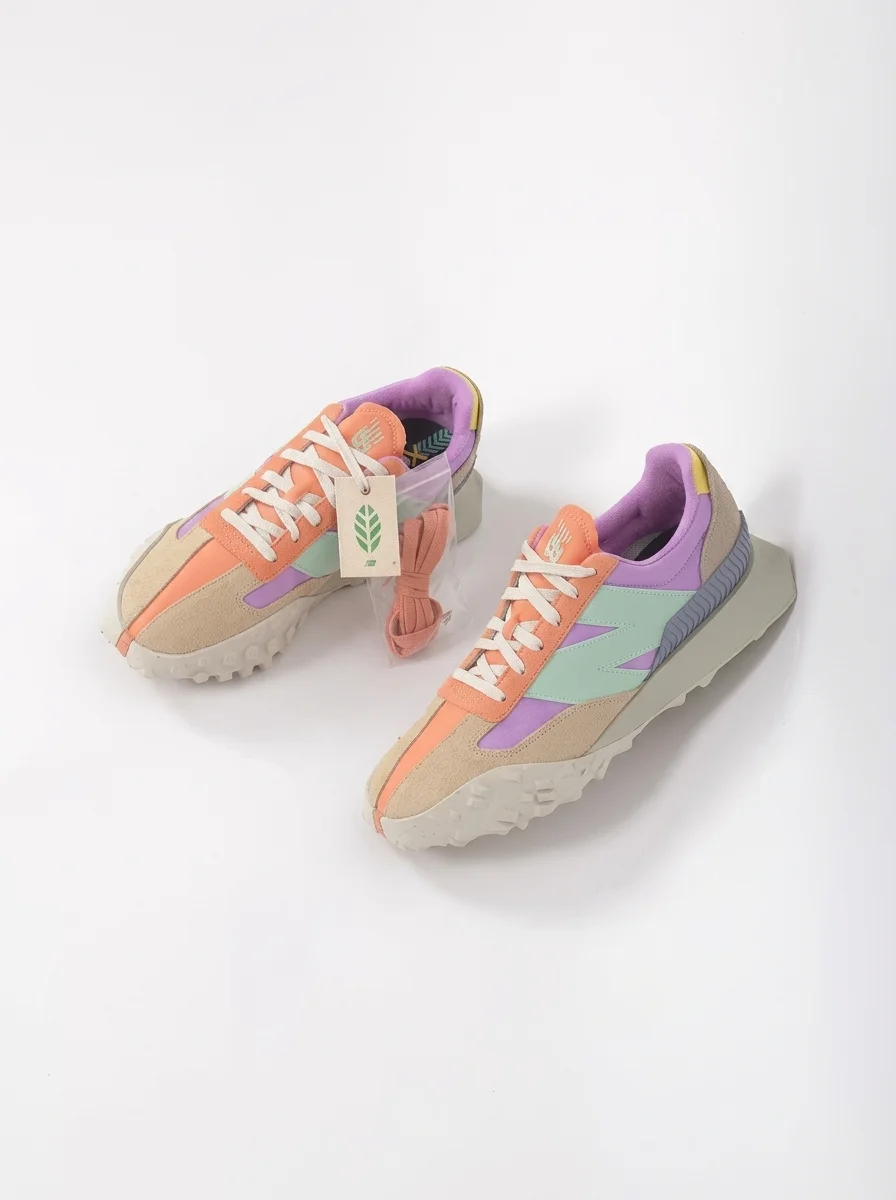Close-up of a low-profile retro sneaker worn with casual streetwear