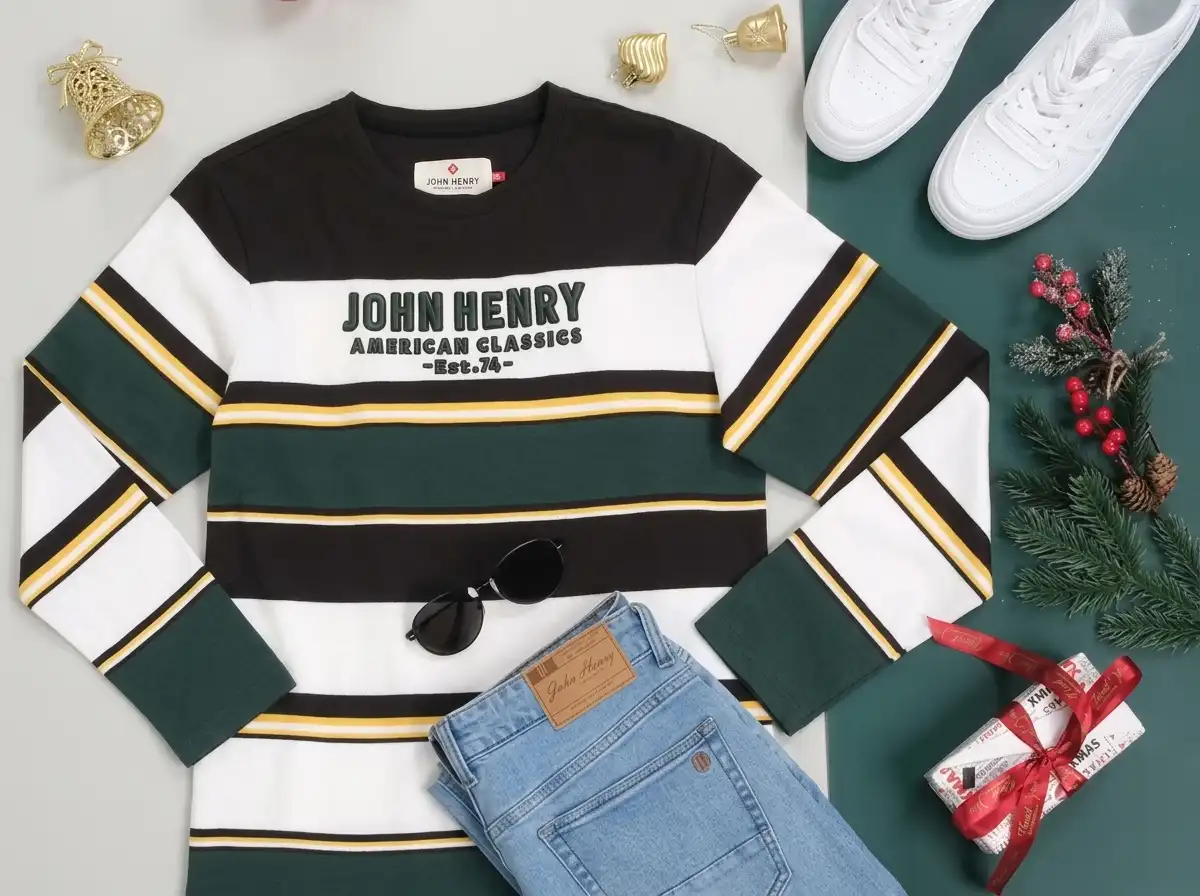 A knit sweater, denim, and sneakers laid out together, showing three different clothing textures side by side.